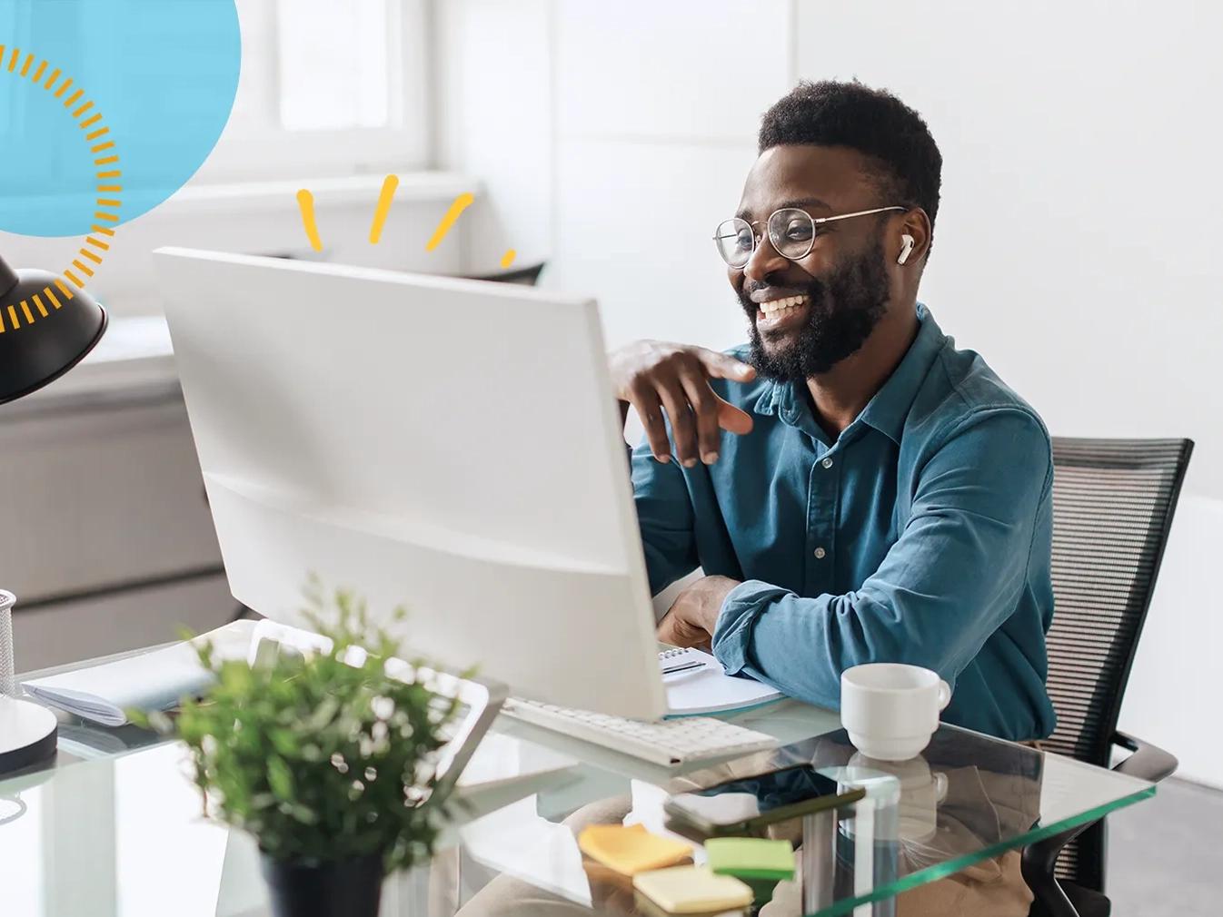 man talking on a video call on a desktop computer