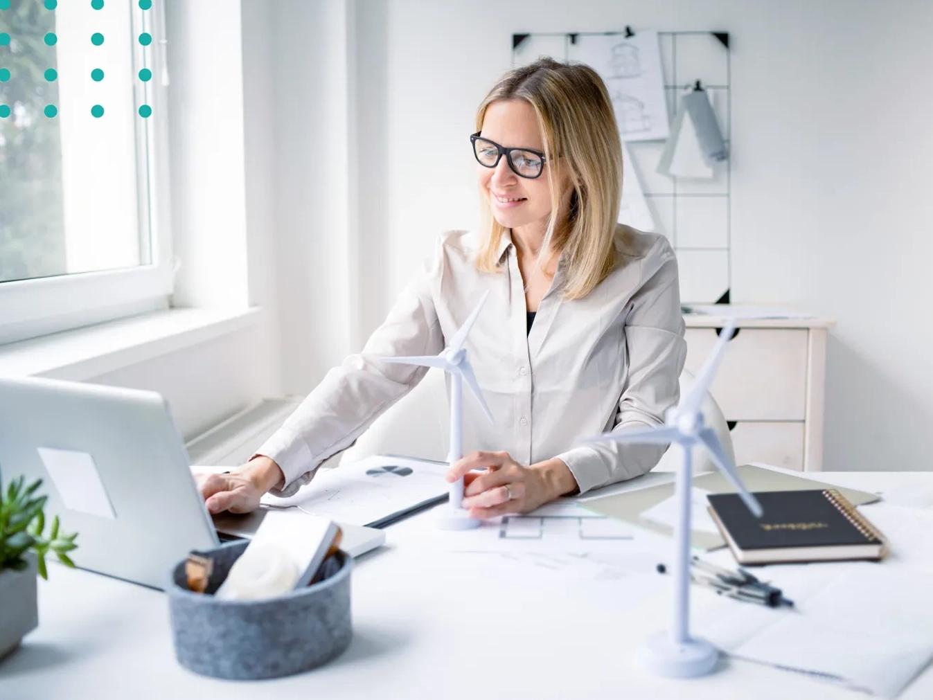 woman working with windmill models