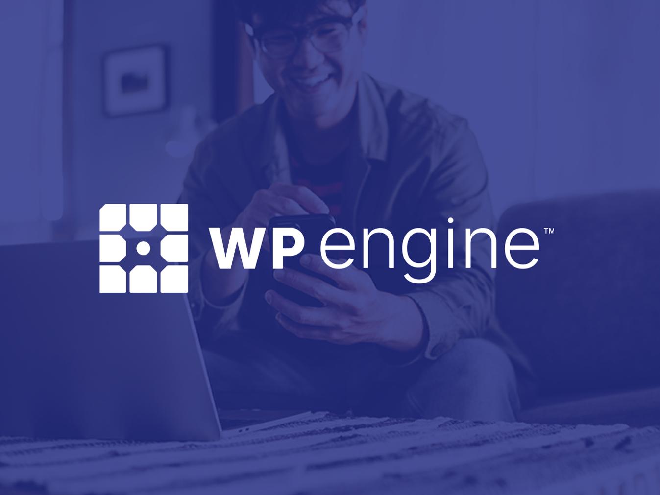 Logo for WP Engine, a Business Wire customer, overlayed on an image of a man using a smartphone