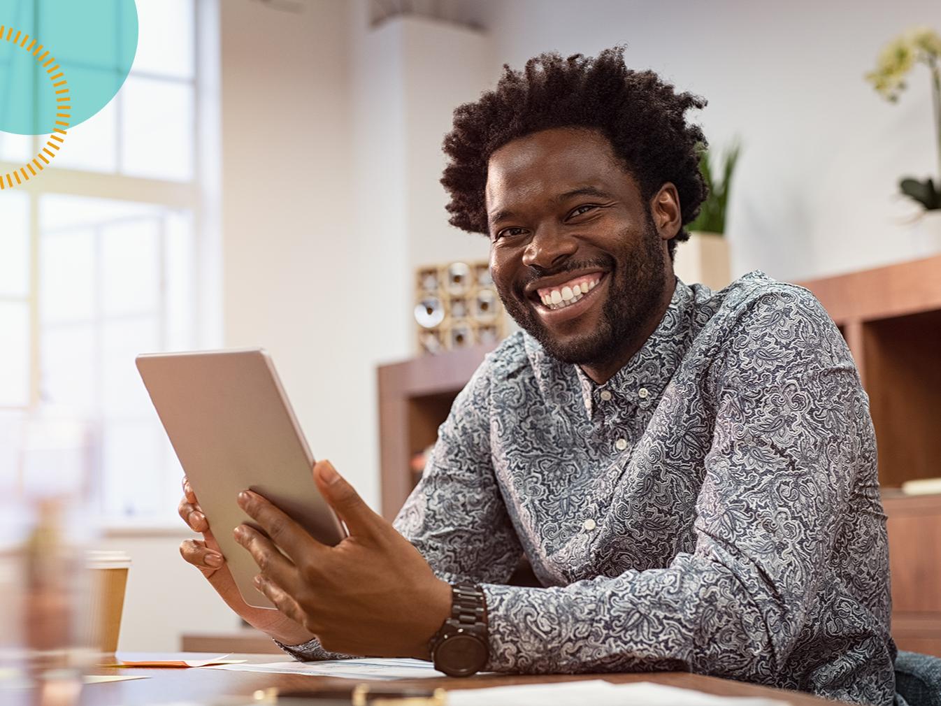 man holding a tablet