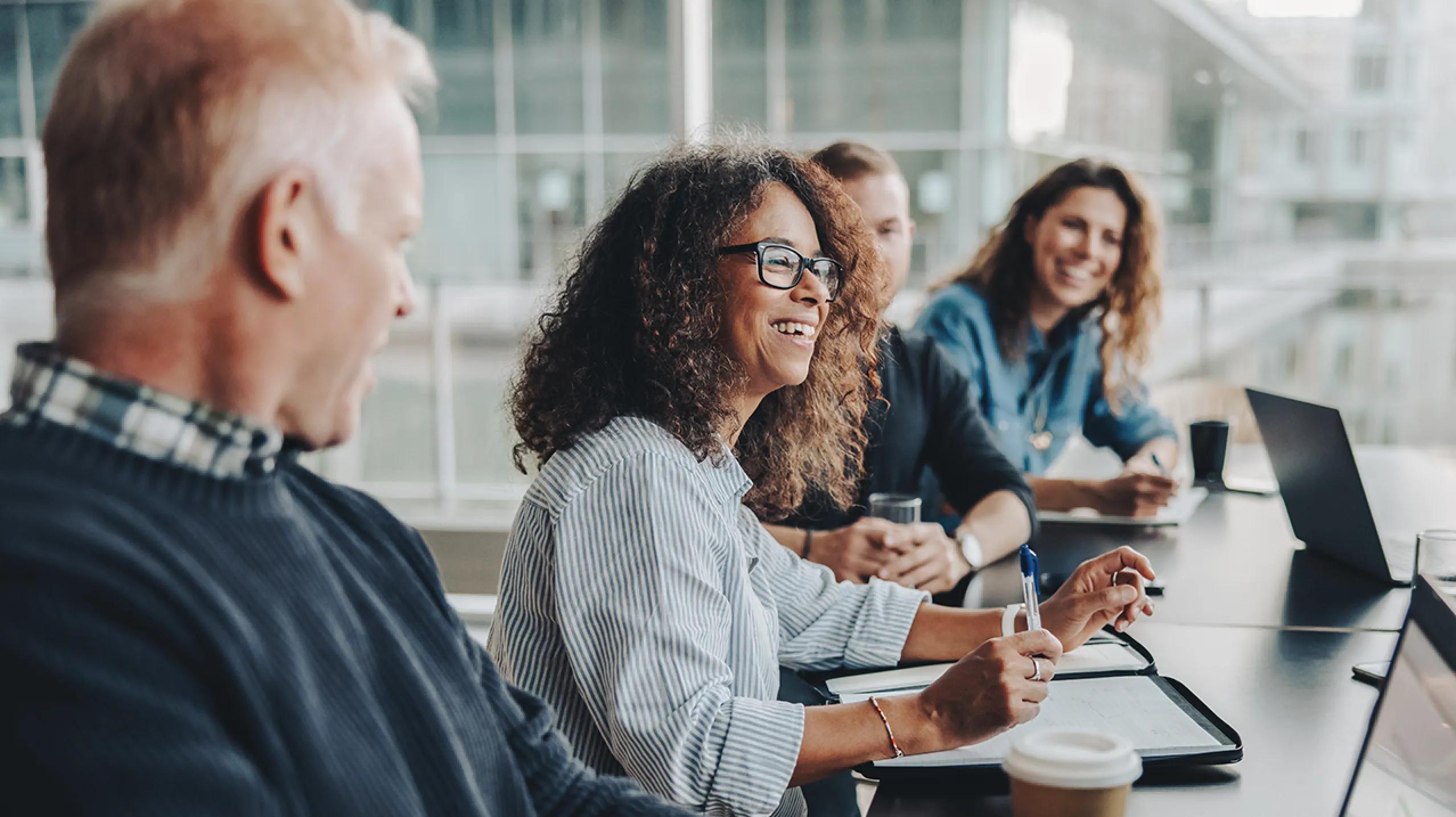 team collaborating around a conference table